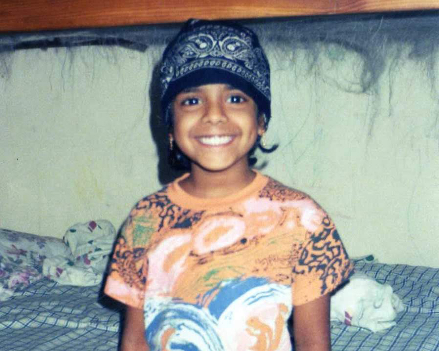 Young Roothie in a bandana